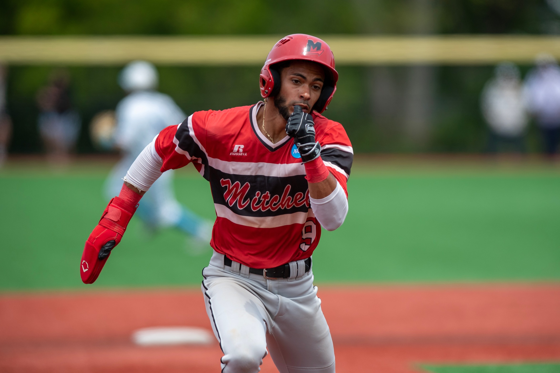 Baseball Rallies for First Florida Win