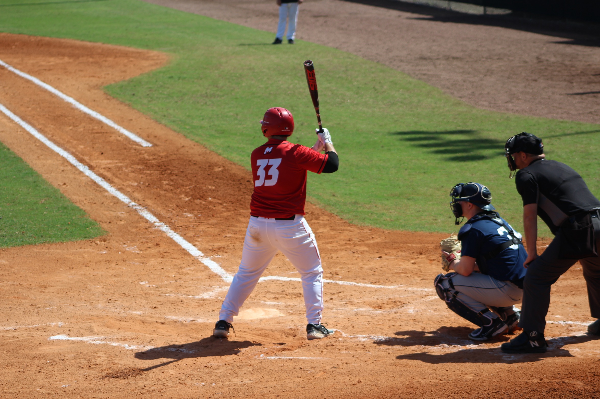 Baseball Holds Off Monks for Victory in GNAC Opener